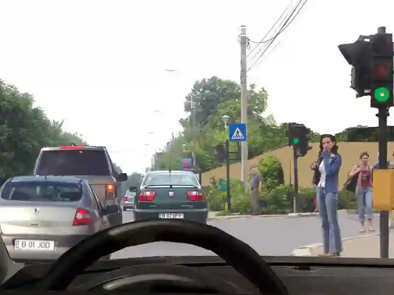 Imagine întrebare examen auto: Cum veți proceda dacă intersecția care urmează este blocată din cauza aglomerației?
