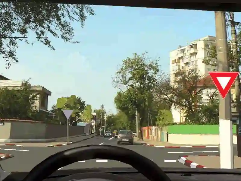 Imagine întrebare examen auto: În această situație, cui trebuie să acordați prioritate?