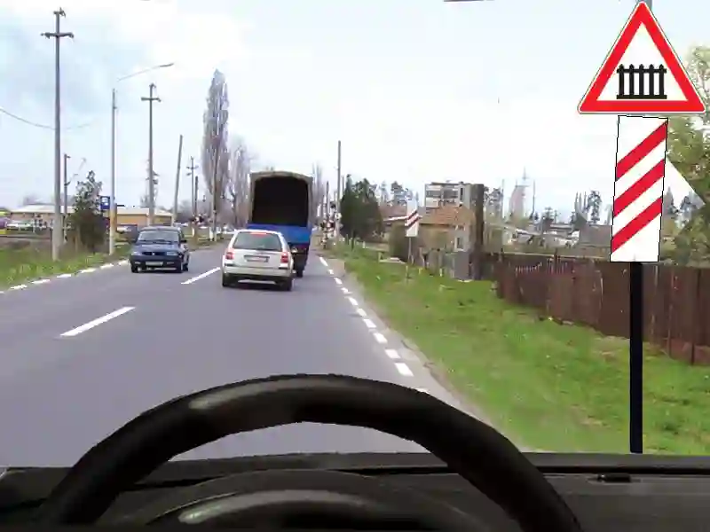Imagine întrebare examen auto: Ce obligații aveți în situația prezentată în imagine?